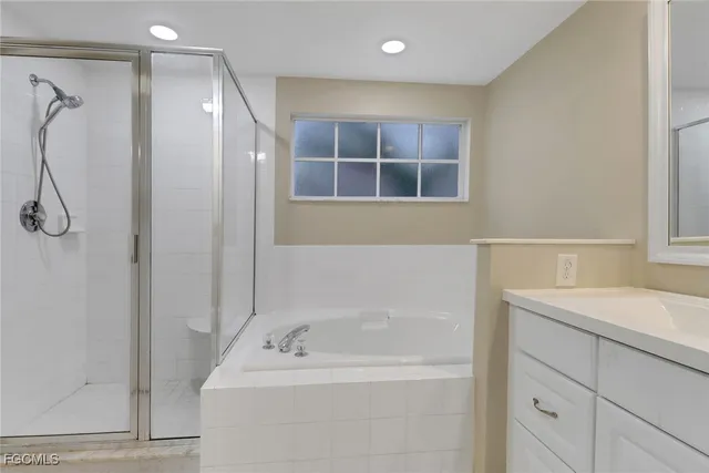 a bathroom with a sink and a bathtub