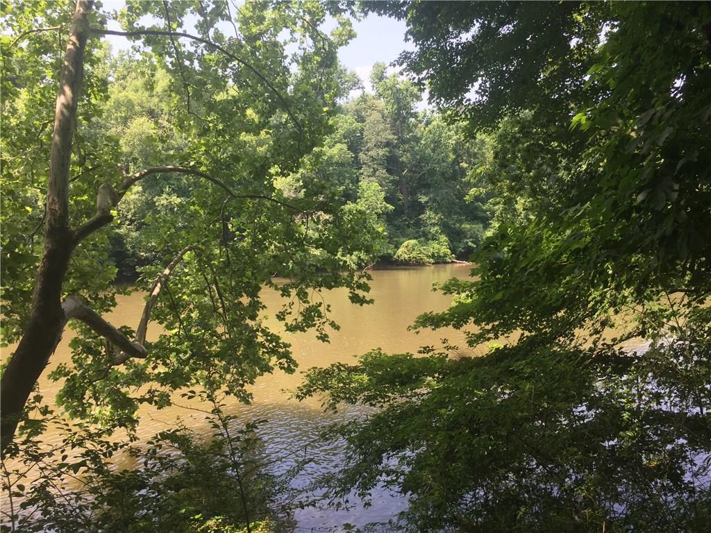 Lot 9 Shoals Ferry Road Southeast Rome, GA 30161 - Photo 1 of 1 The River is Quite Wide and Has Varying Depths and Swiftness Depending On The Flood Control Discharge Of Water Monitored and Regulated By The Corp of Engineers At Allatoona Dam just upstream a few miles.