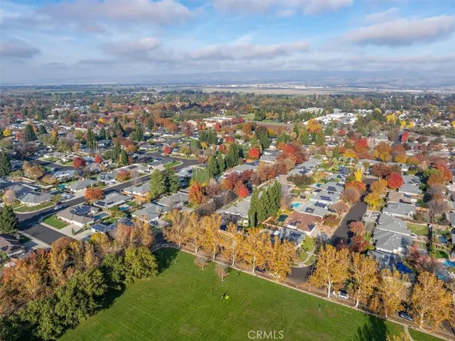 a view of a house with a yard and garage