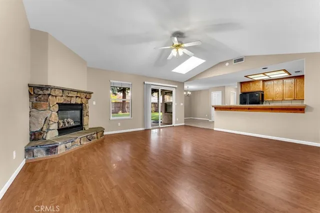 a view of a livingroom with wooden floor