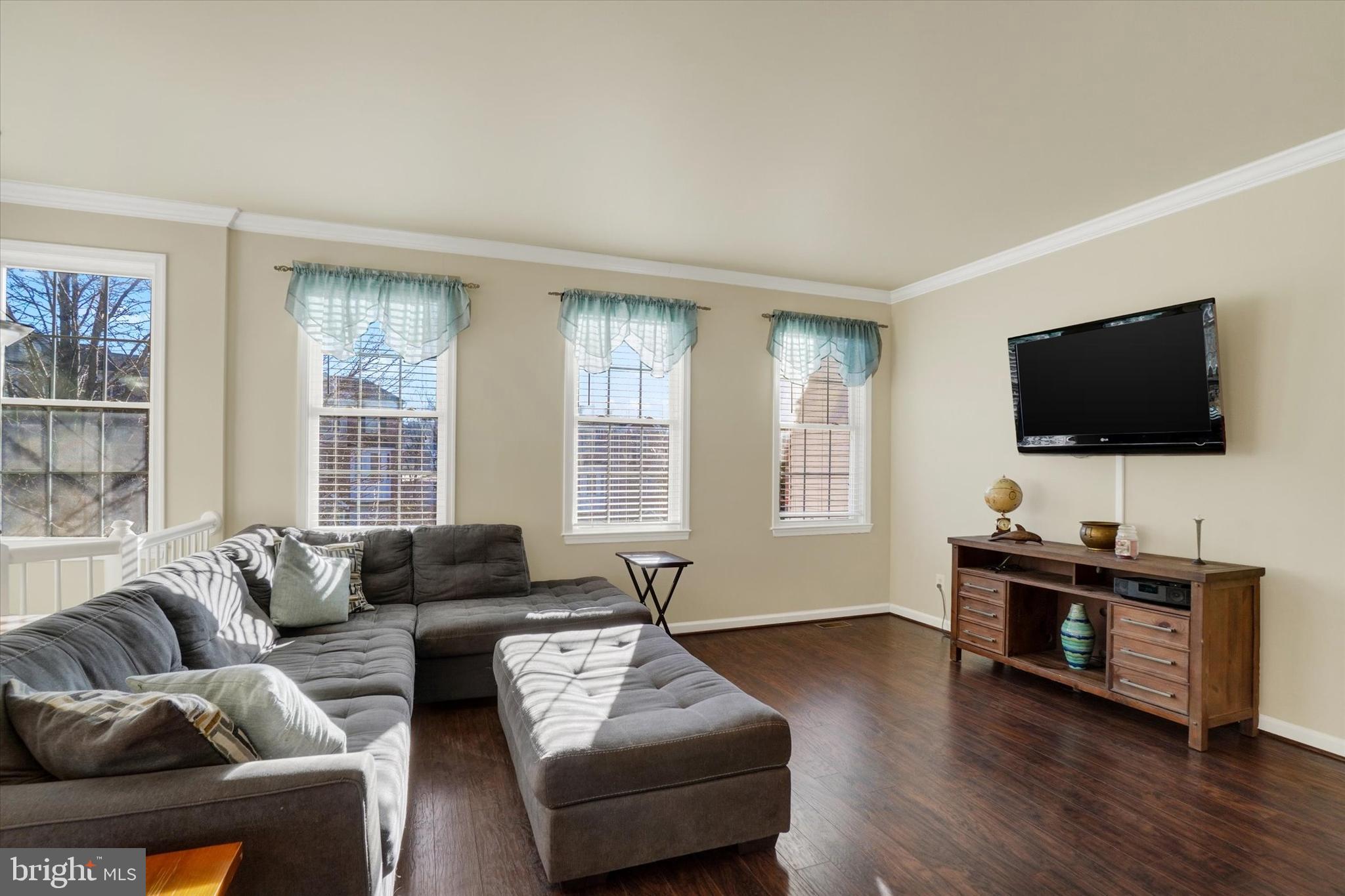 258 North Front Street New Freedom, PA 17349 - Photo 8 of 33 a living room with furniture and a flat screen tv