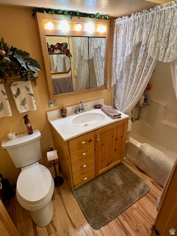 1454 East Little Sweden Road Heber City, UT 84032 - Photo 22 of 35 Full bath with vanity, shower / bath combination with curtain, and light wood-type flooring