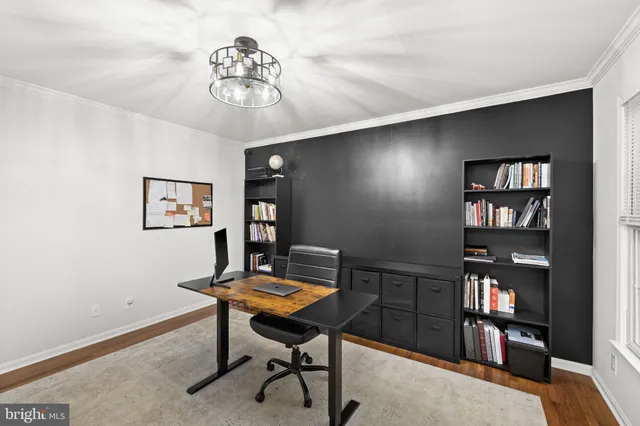 a view of a workspace with furniture