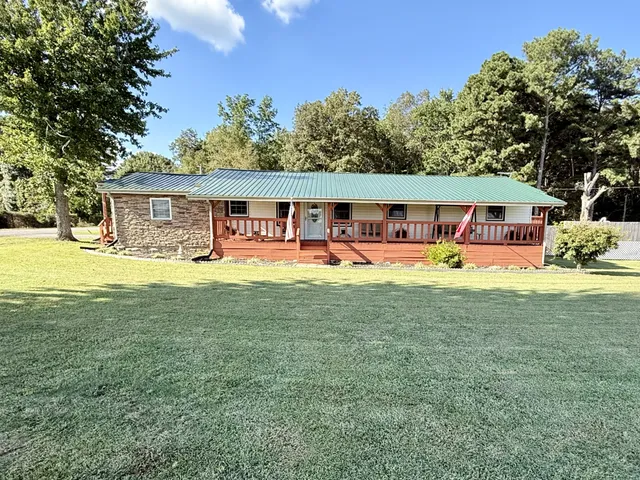 a view of porch with wooden floor