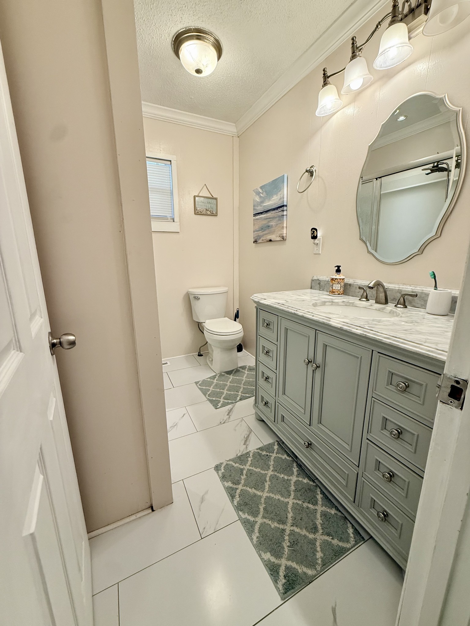 26 Water Cure Road Belvidere, TN 37306 - Photo 13 of 35 a bathroom with a double vanity sink mirror and toilet