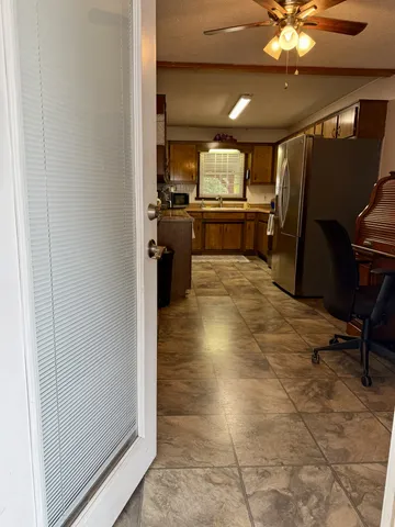 a bathroom with a sink and a window