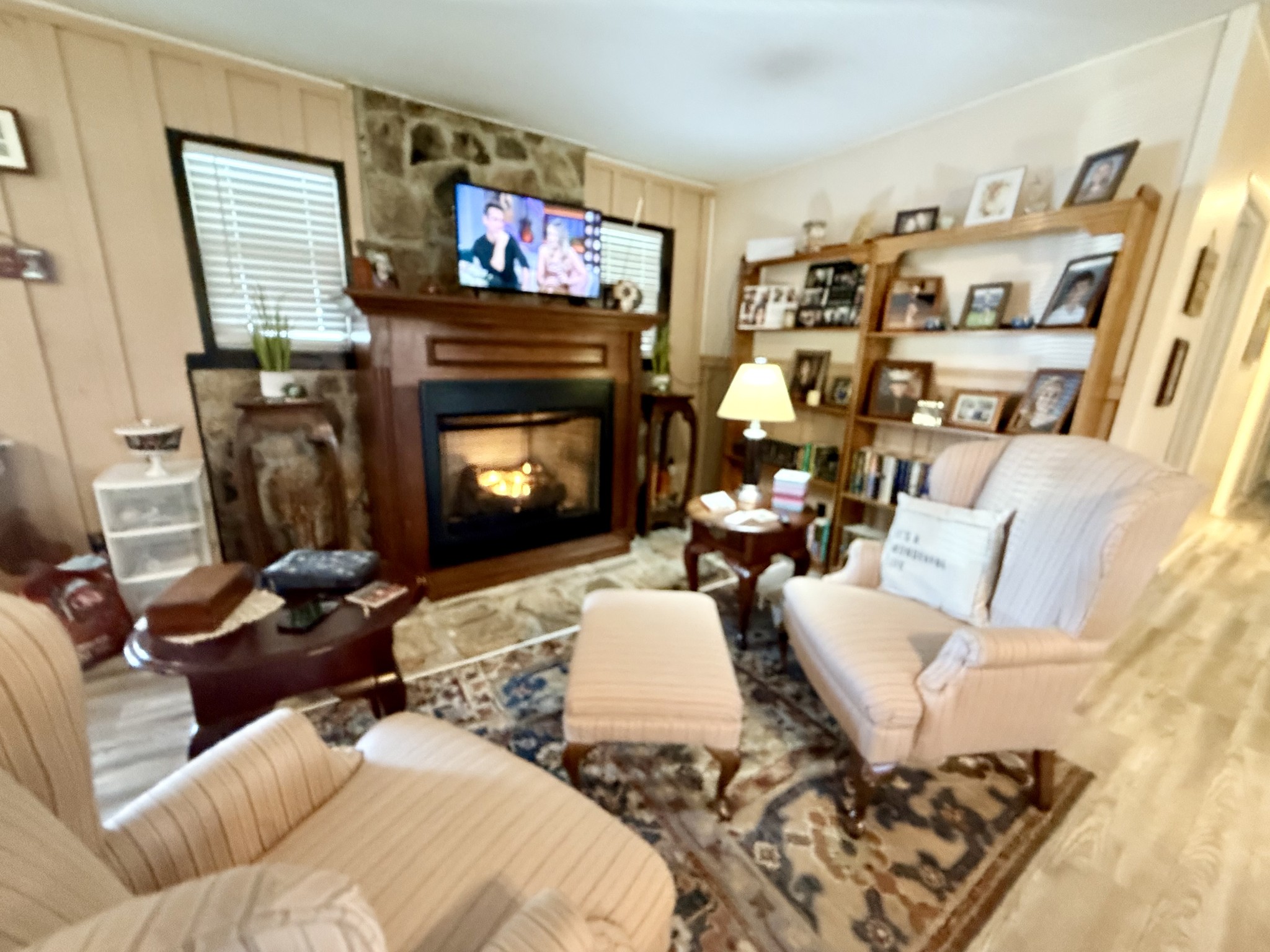 26 Water Cure Road Belvidere, TN 37306 - Photo 10 of 35 a living room with furniture a flat screen tv and a fireplace