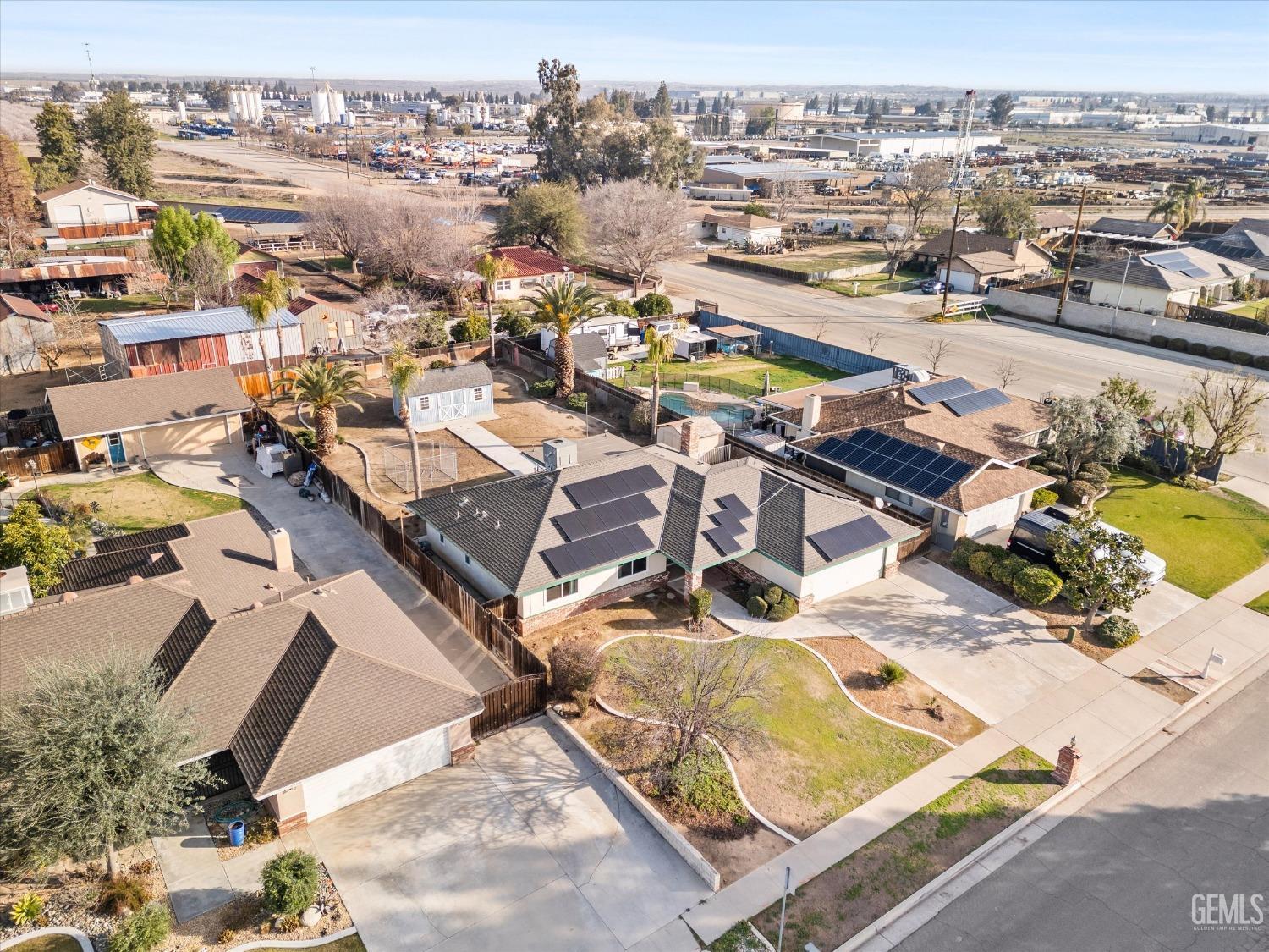 Undisclosed Address Bakersfield, CA 93308 - Photo 23 of 33 an aerial view of a city with lots of residential buildings