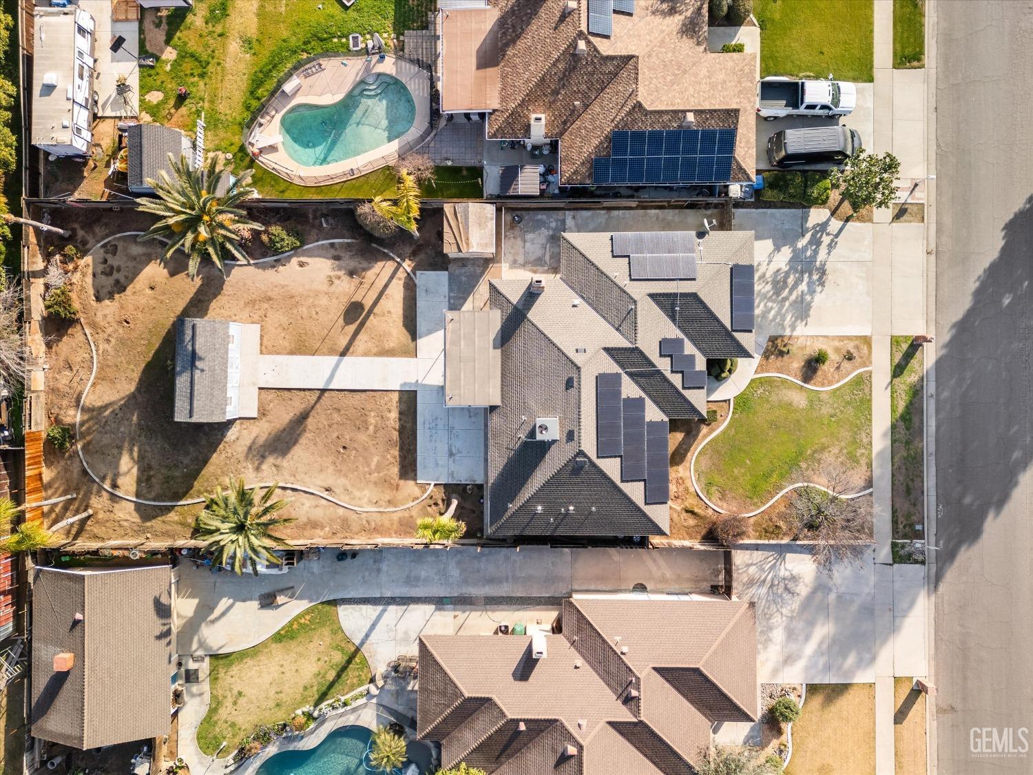 Undisclosed Address Bakersfield, CA 93308 - Photo 24 of 33 an aerial view of a house with swimming pool