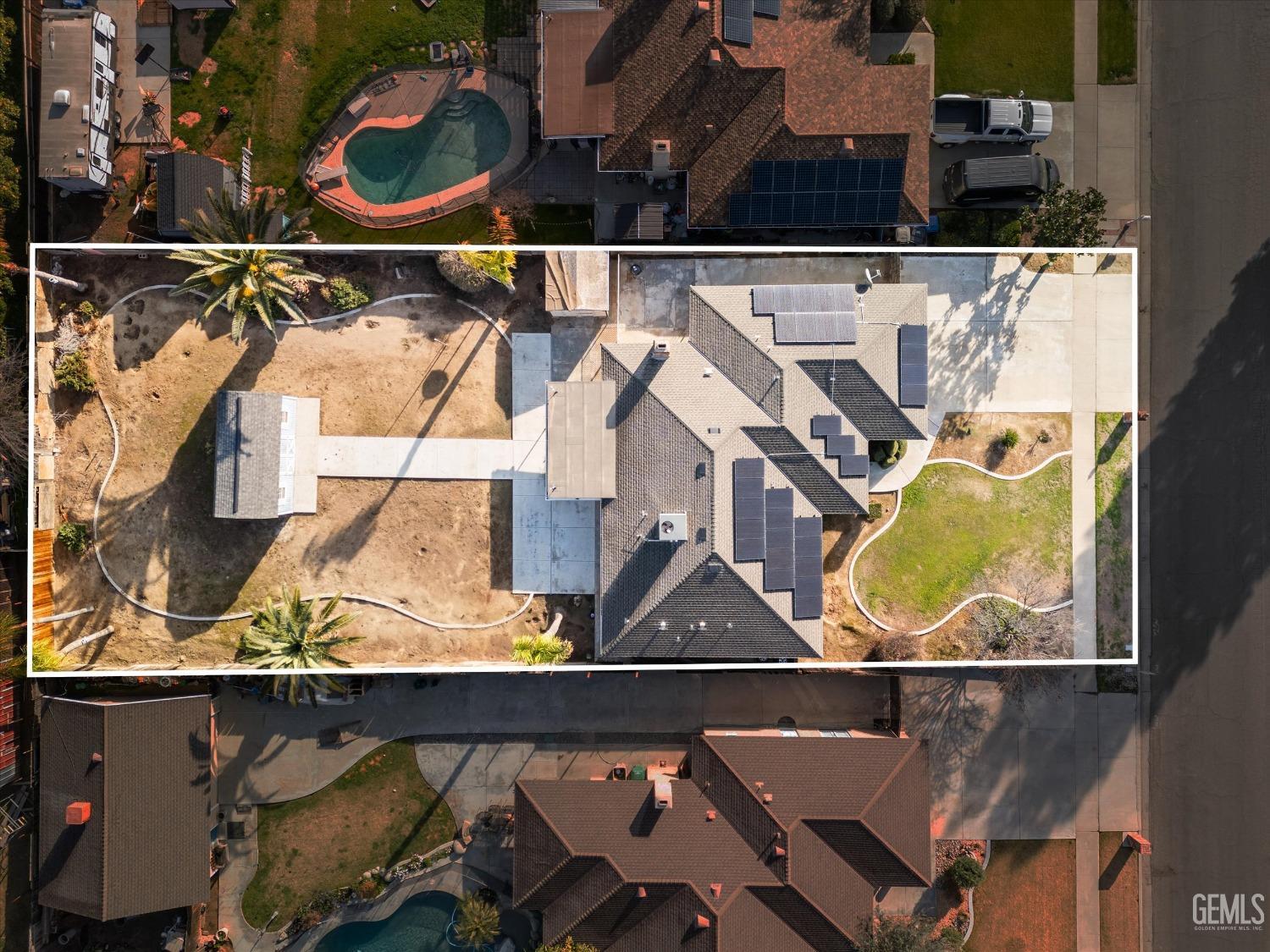 Undisclosed Address Bakersfield, CA 93308 - Photo 33 of 33 an aerial view of a house with a swimming pool