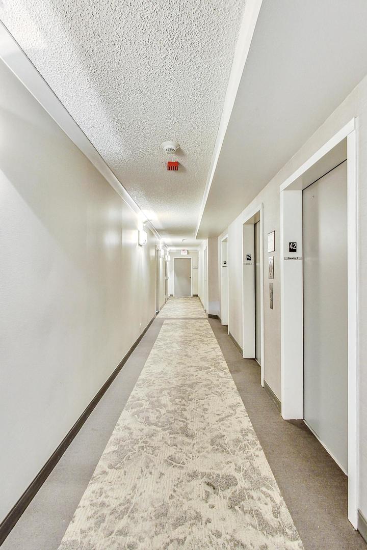 Undisclosed Address Chicago, IL 60601 - Photo 2 of 22 a view of a hallway