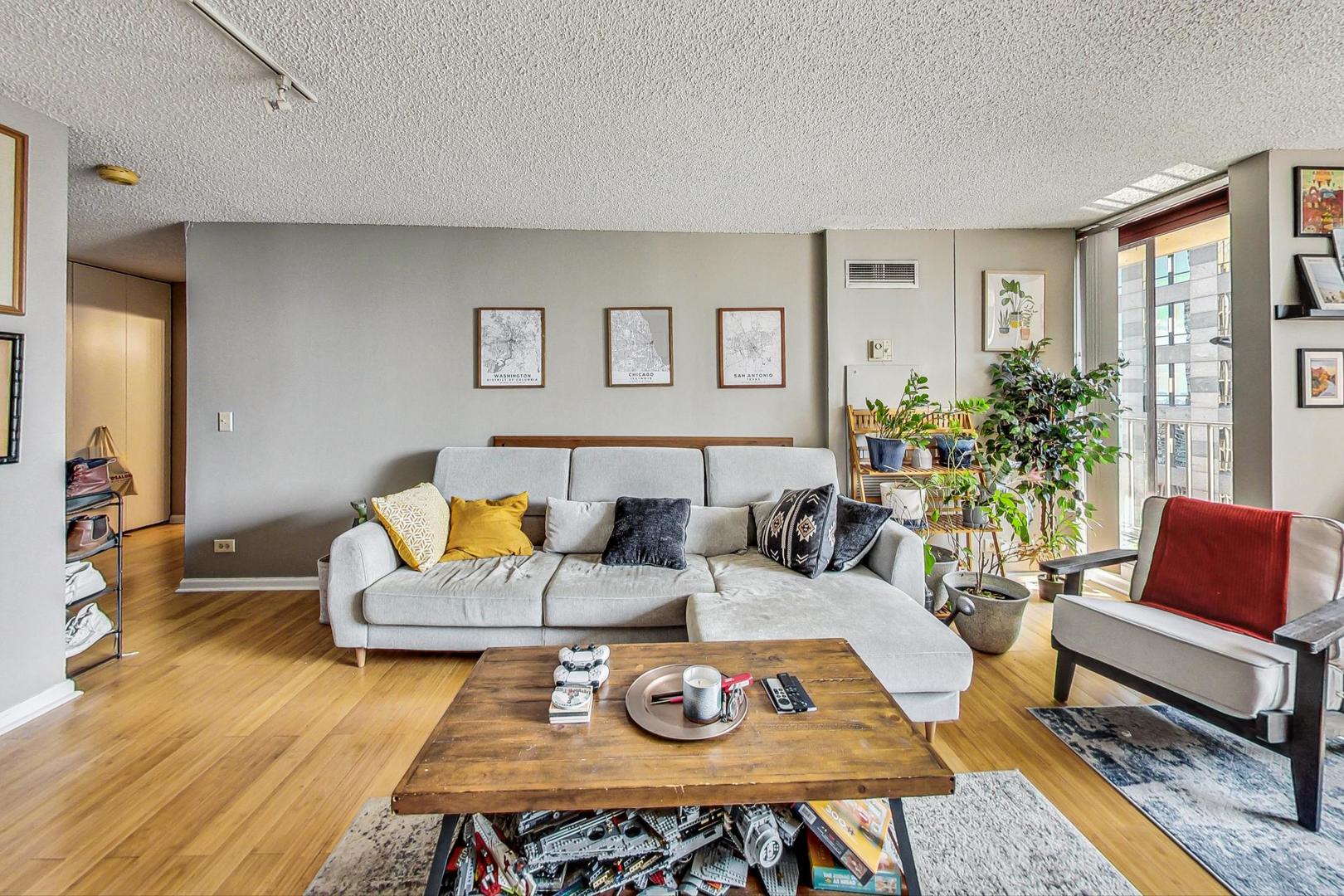 Undisclosed Address Chicago, IL 60601 - Photo 5 of 22 a living room with furniture and a wooden floor