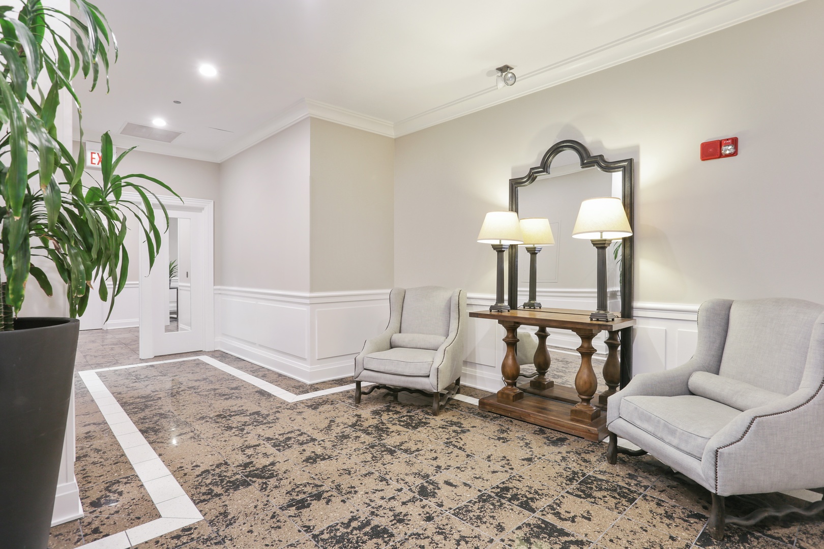 630 North State Street, Unit 1609 Chicago, IL 60654 - Photo 4 of 22 a living room with furniture and a potted plant