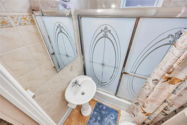 a close view of water heater and wooden door