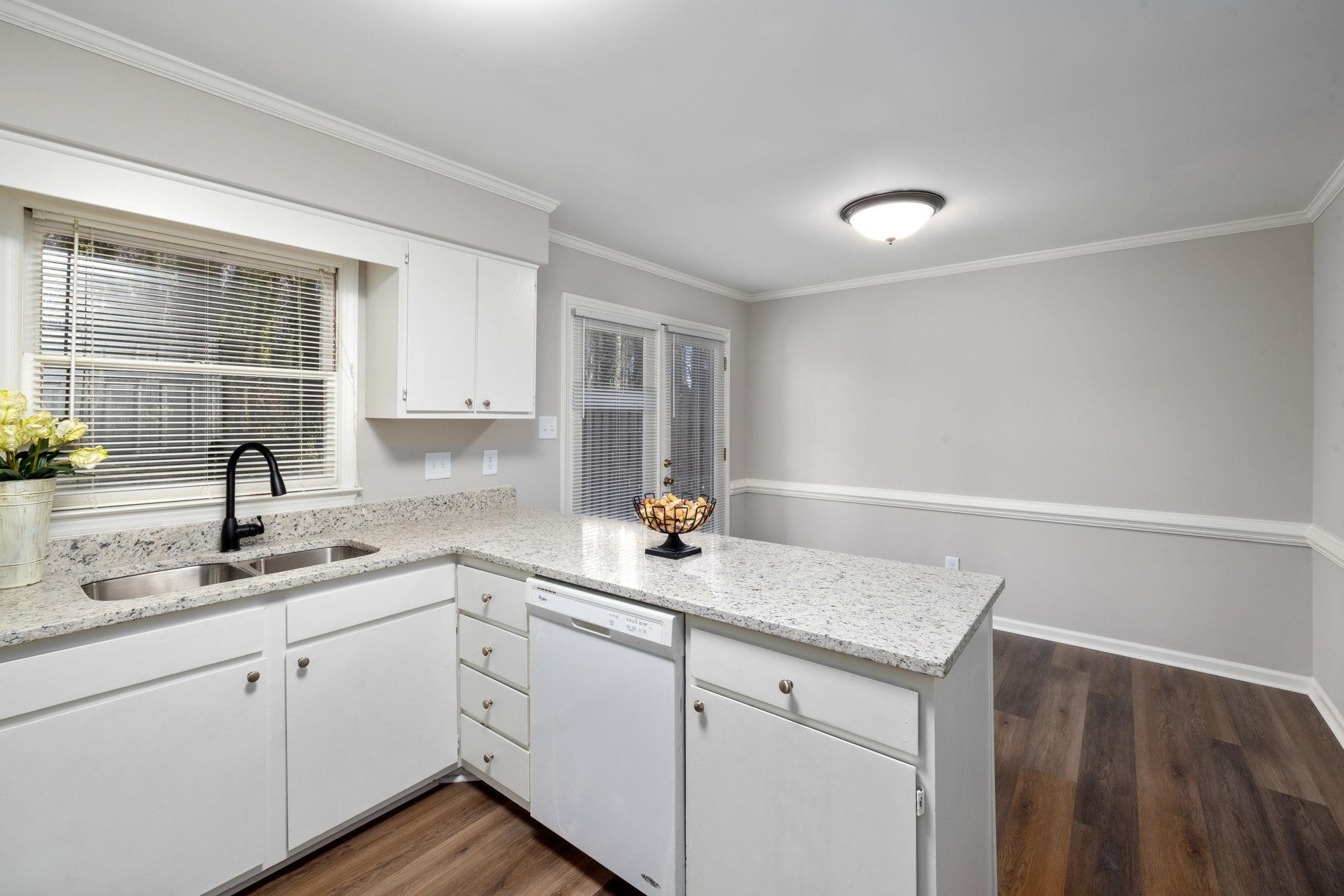 717 Charleston Road, Unit 717 Raleigh, NC 27606 - Photo 13 of 30 Dining area on the other side of the peninsula Kitchen