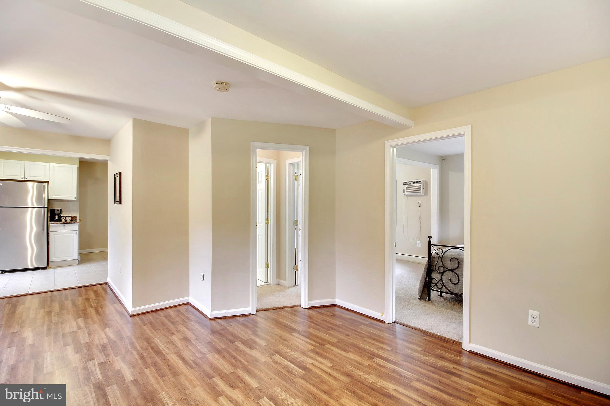 12014 Dewey Road Silver Spring, MD 20906 - Photo 16 of 30 Family Room view to DR and MBR