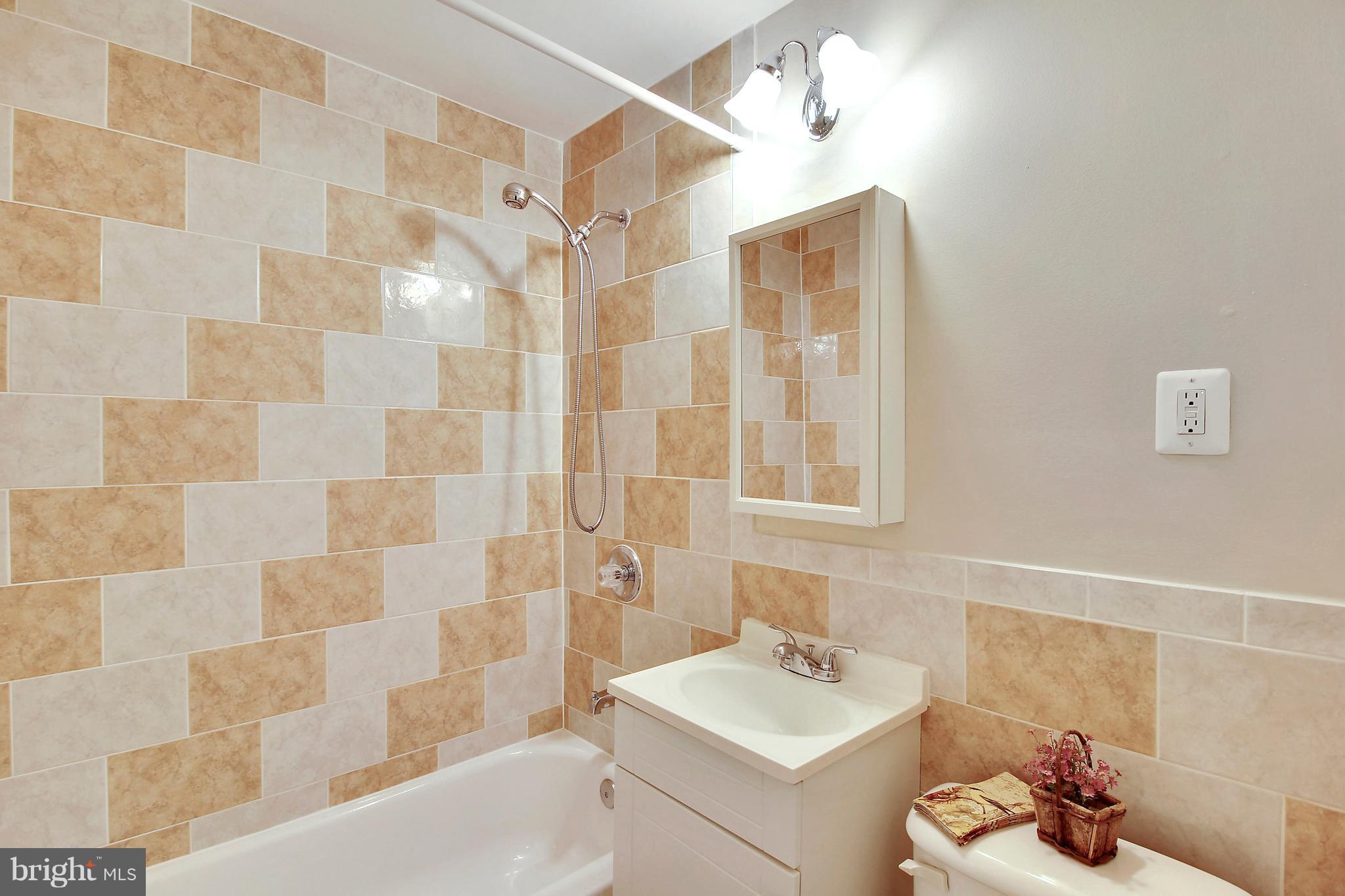 12014 Dewey Road Silver Spring, MD 20906 - Photo 23 of 30 Ceramic Hall tub BA