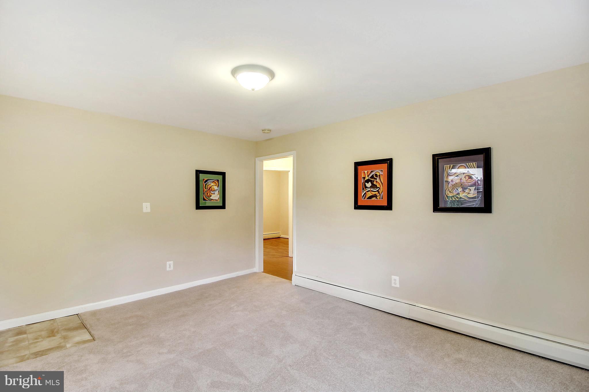 12014 Dewey Road Silver Spring, MD 20906 - Photo 7 of 30 Spacious LR w/ new carpet and freshly painted