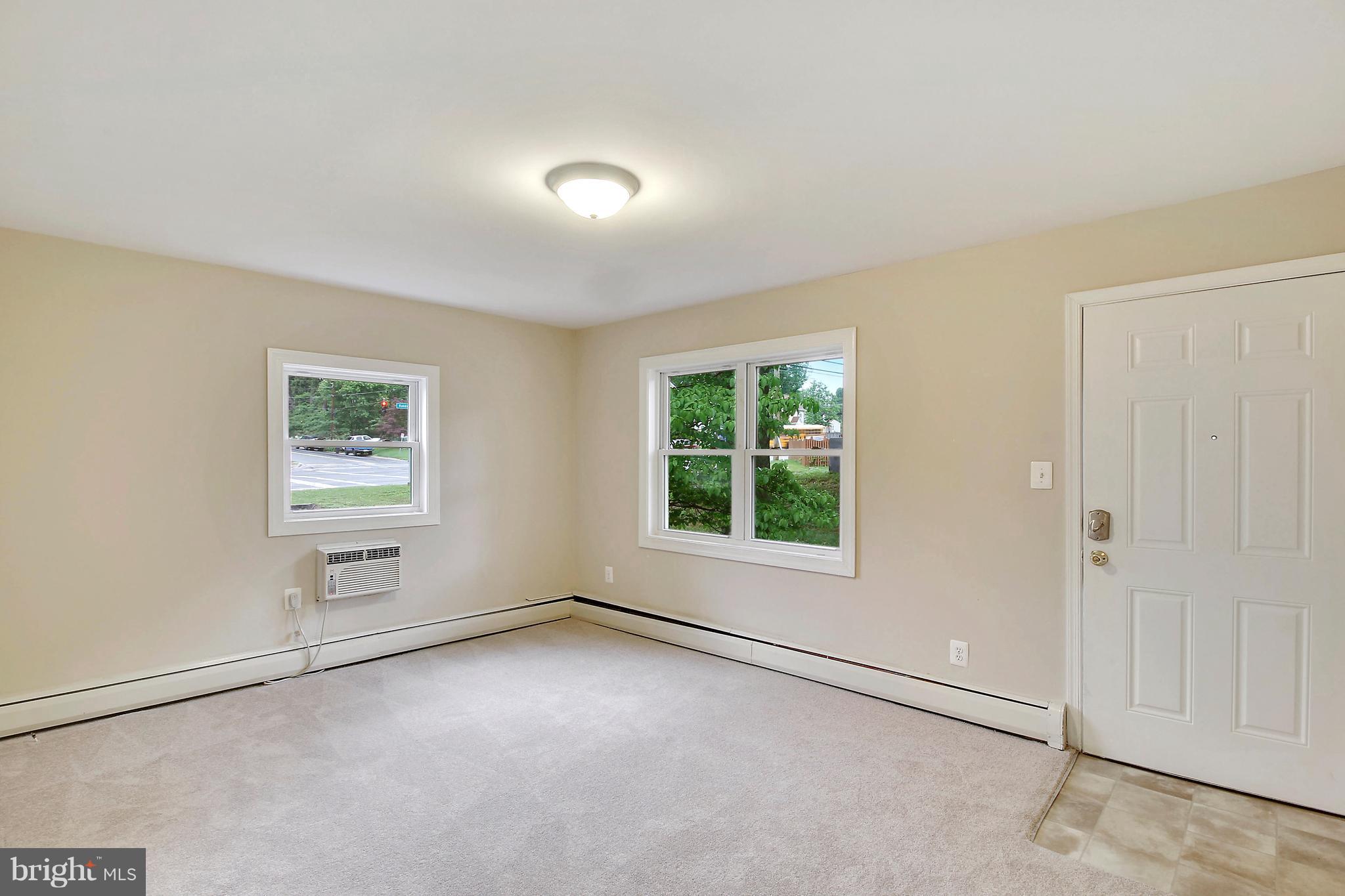 12014 Dewey Road Silver Spring, MD 20906 - Photo 8 of 30 Sun-filled new windows brighten this spacious LR