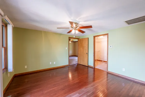 a view of a room with racks on the wall