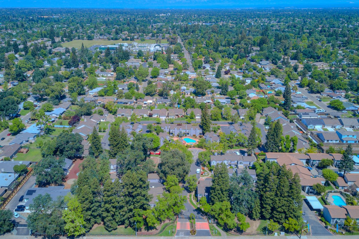 4055 Alex Lane Carmichael, CA 95608 - Photo 32 of 47 an aerial view of residential houses with outdoor space and trees