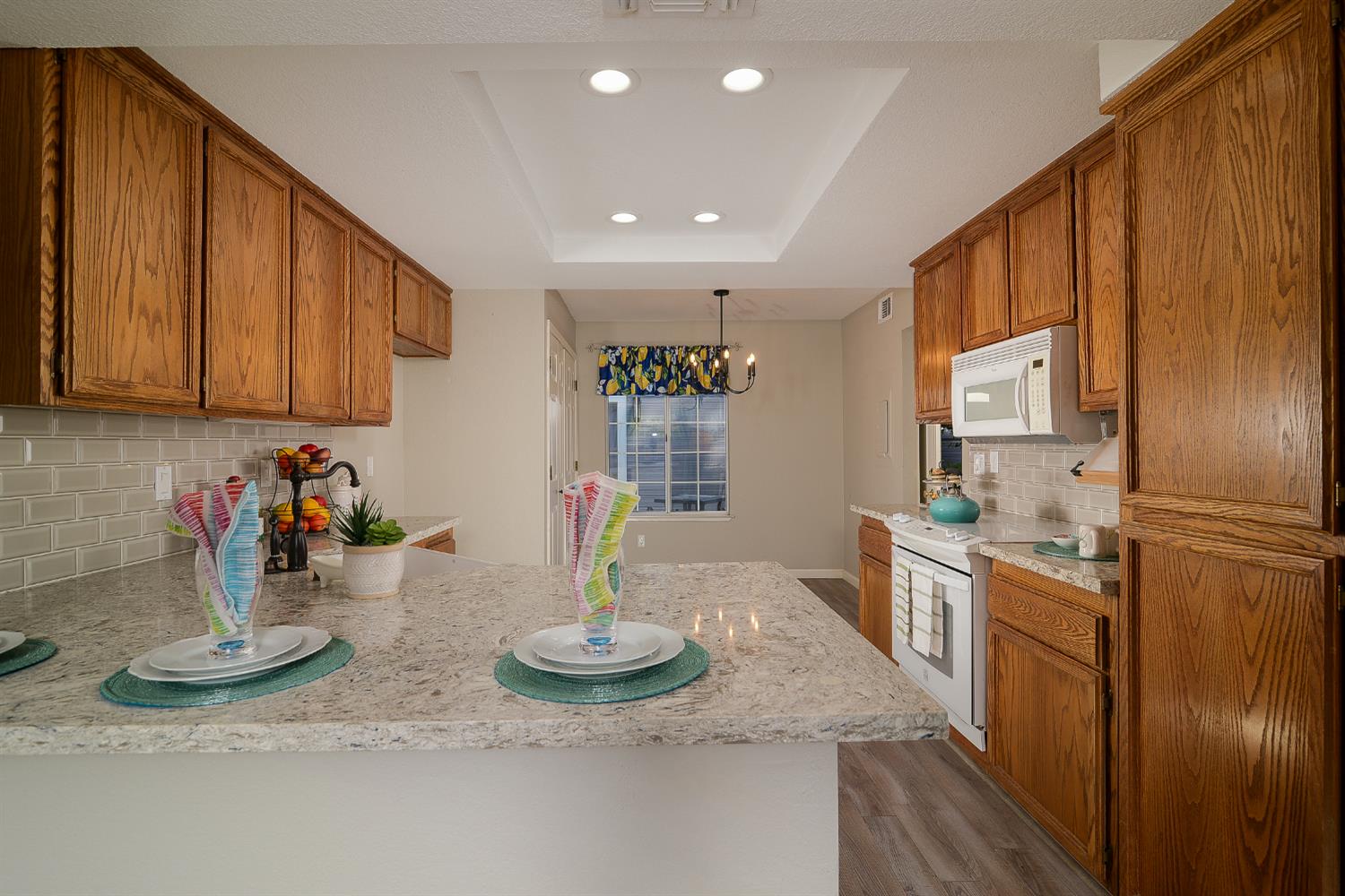 4055 Alex Lane Carmichael, CA 95608 - Photo 4 of 47 a kitchen with sink and refrigerator