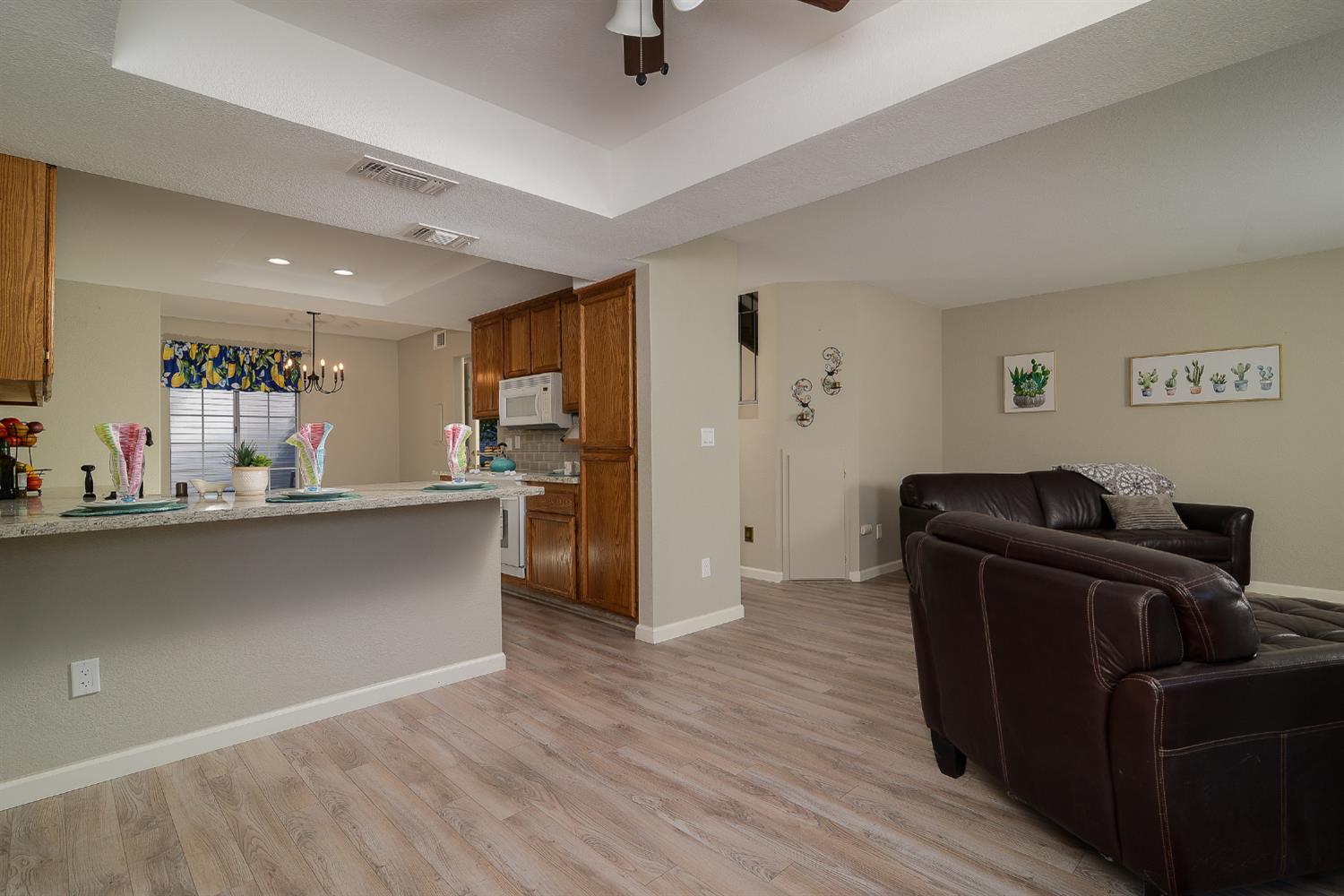 4055 Alex Lane Carmichael, CA 95608 - Photo 10 of 47 a living room with hard wood floors and furniture