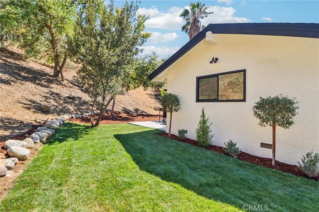 11060 Vanda Way Sun Valley, CA 91352 - Photo 27 of 43 a front view of a house with a yard