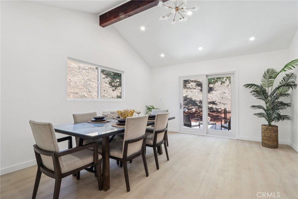 11060 Vanda Way Sun Valley, CA 91352 - Photo 7 of 43 a view of a dining room with furniture and a potted plant