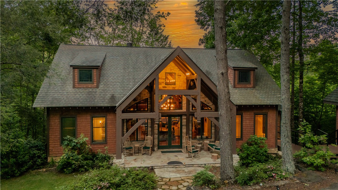 102 State Rd S-39-143 Sunset, SC 29685 - Photo 38 of 47 This charming home is nestled among towering trees, offering a tranquil retreat with rustic elegance.