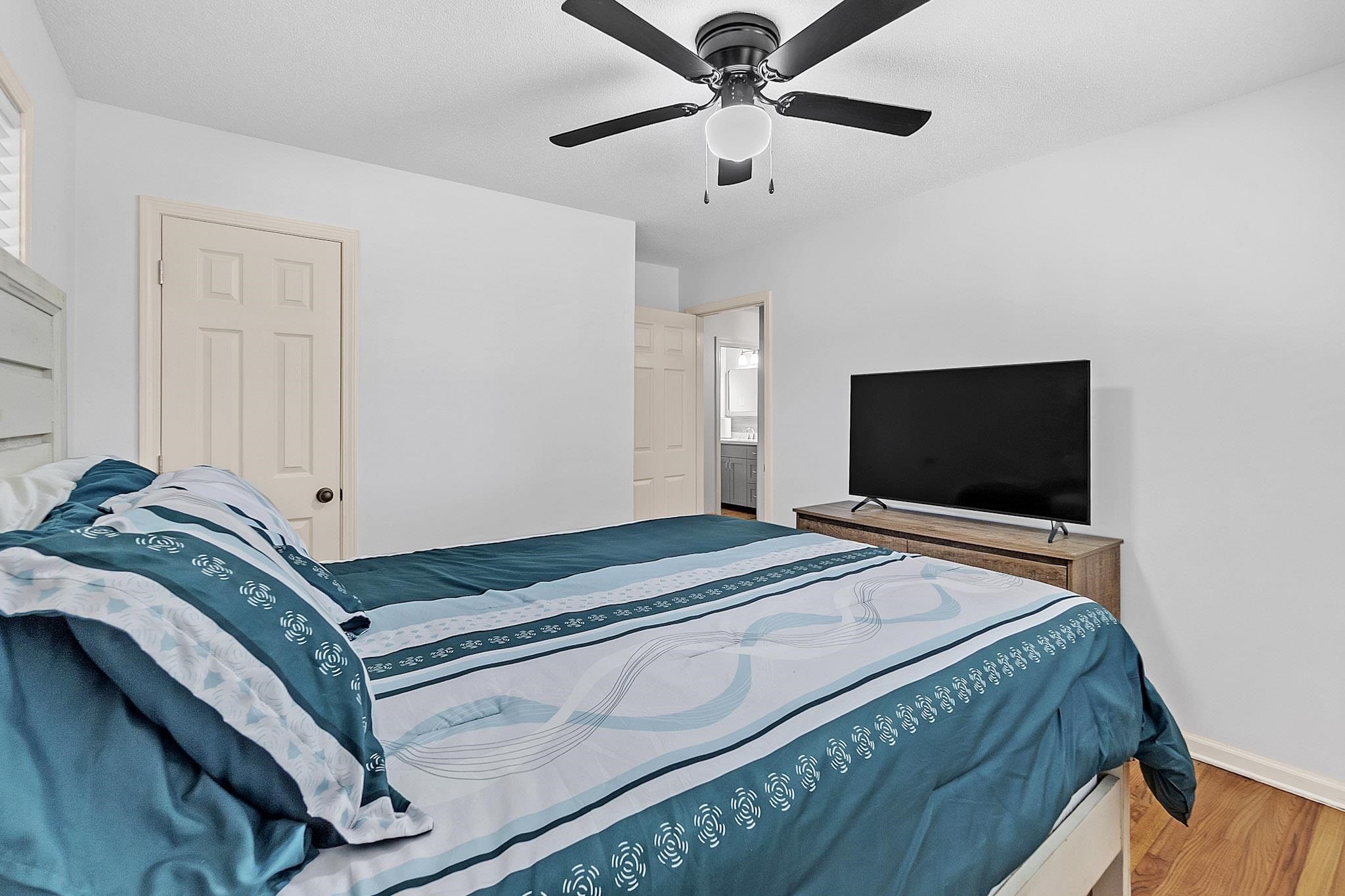 2234 Highway 301 Hernando, MS 38632 - Photo 20 of 27 a bedroom with a bed and a flat screen tv