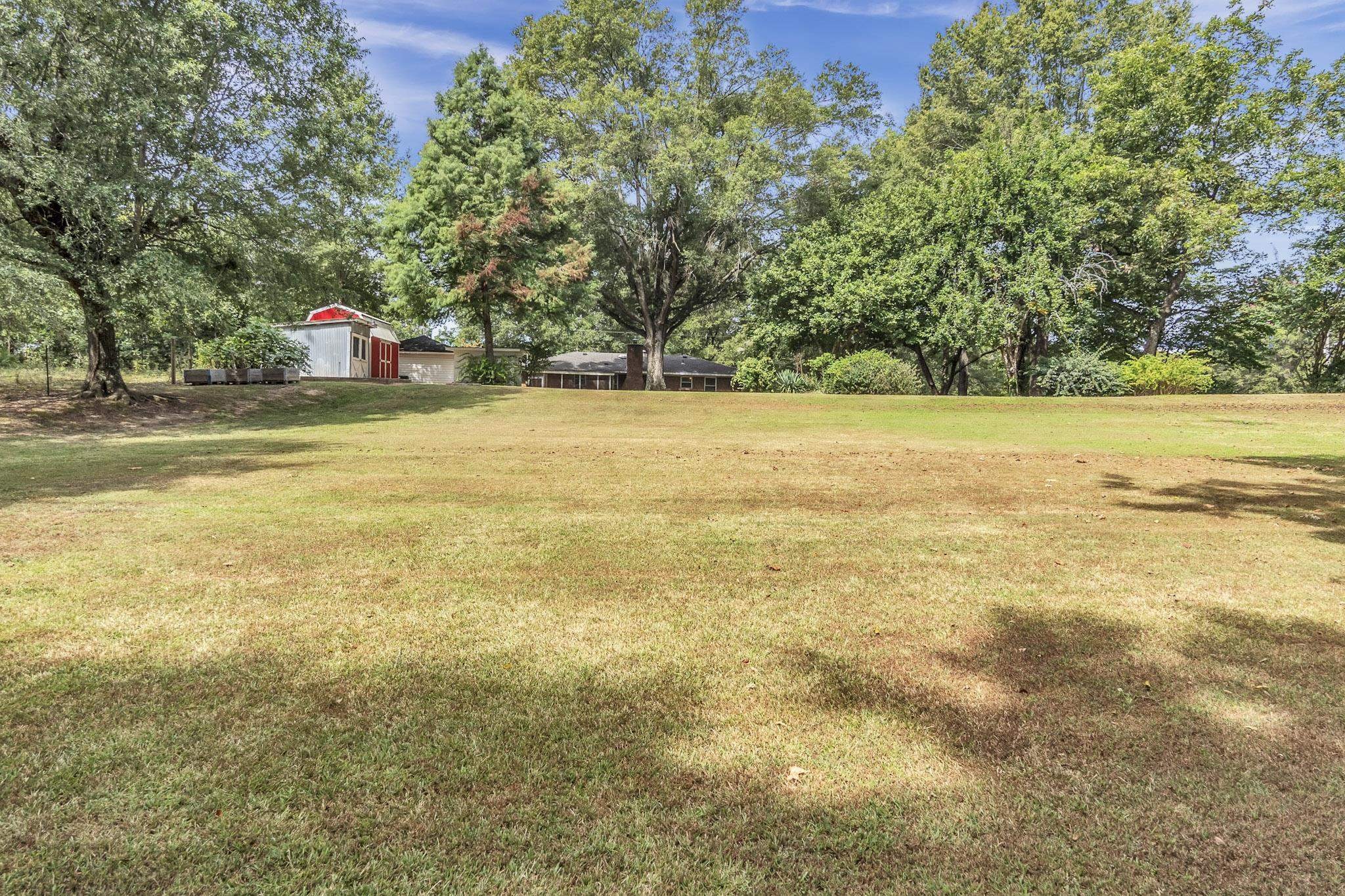 2234 Highway 301 Hernando, MS 38632 - Photo 27 of 27 a view of an outdoor space and swimming pool