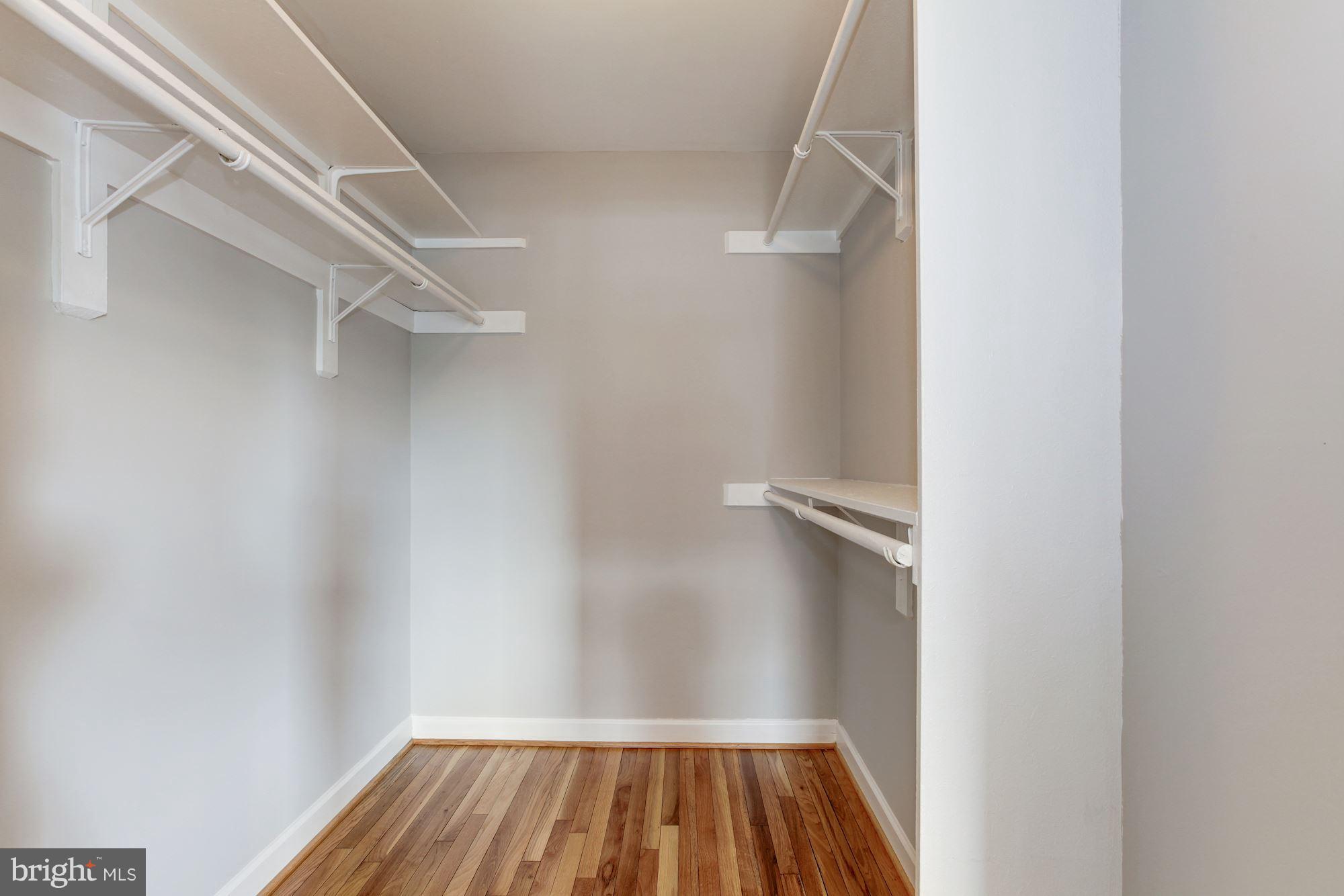 1801 T Street Northwest, Unit C Washington, DC 20009 - Photo 13 of 16 a view of a room with racks on the wall