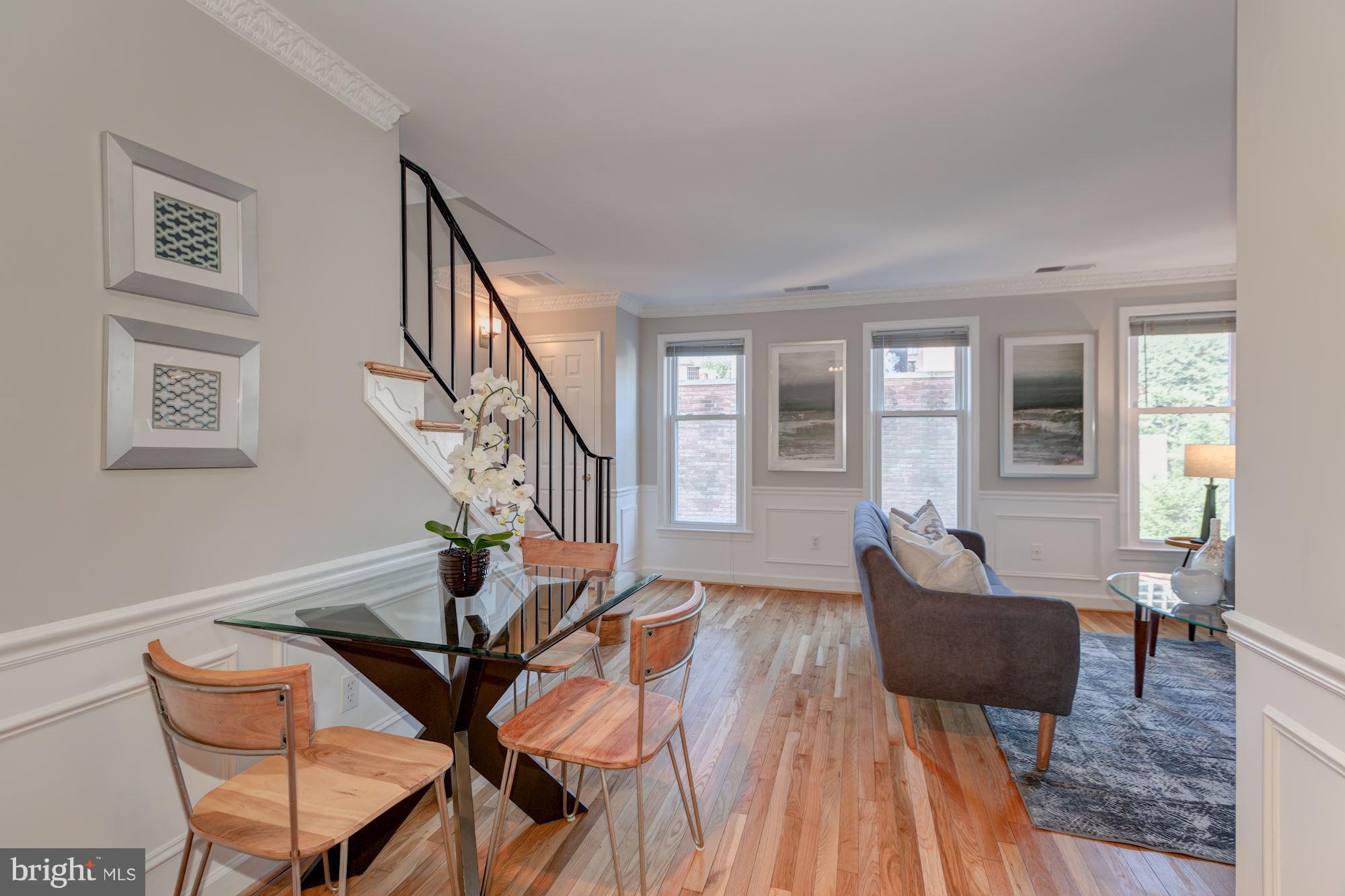 1801 T Street Northwest, Unit C Washington, DC 20009 - Photo 5 of 16 a living room with furniture and wooden floor