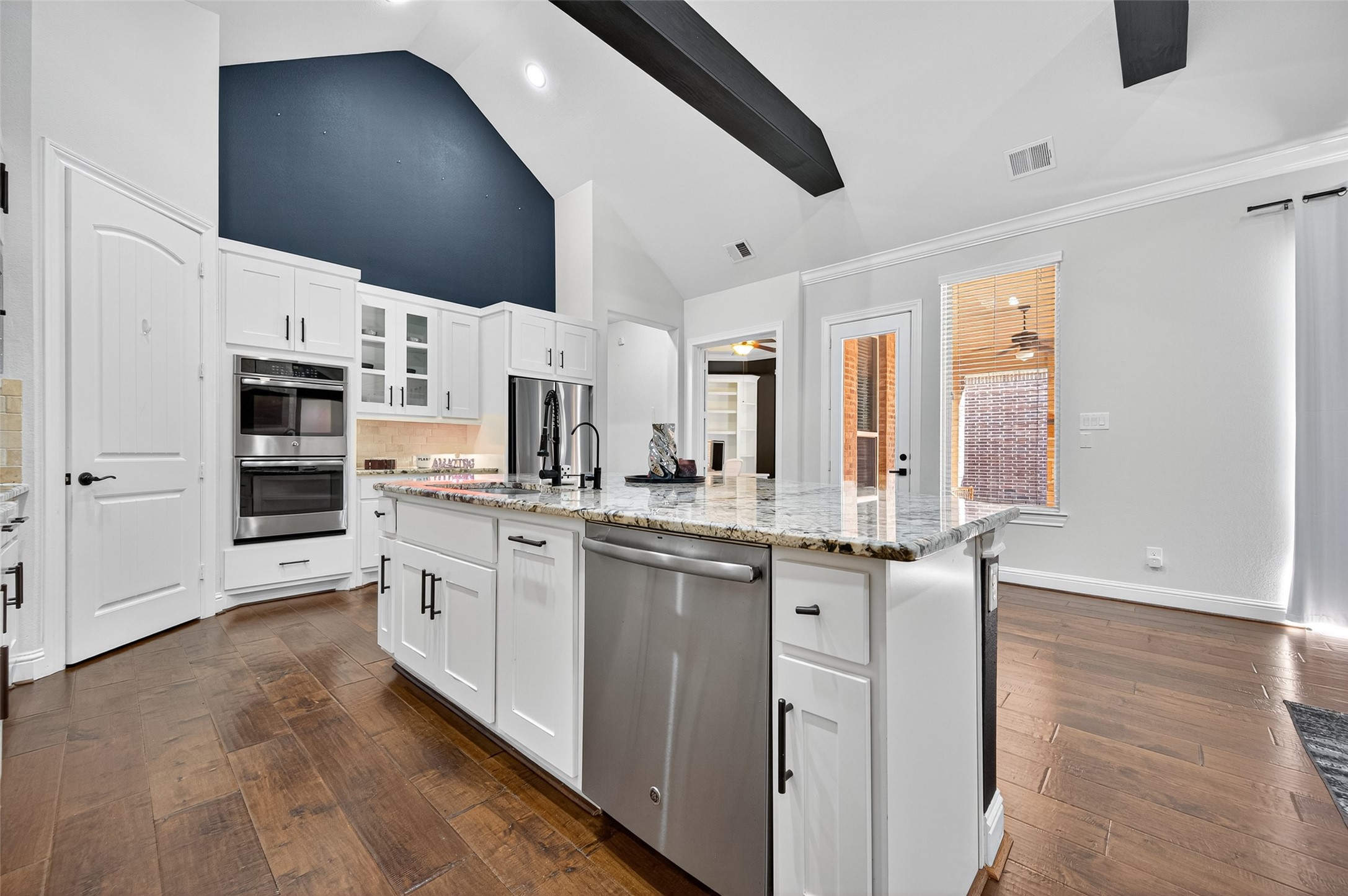 46 Sundown Ridge Place Tomball, TX 77375 - Photo 11 of 46 a kitchen with stainless steel appliances granite countertop a stove a sink and a refrigerator