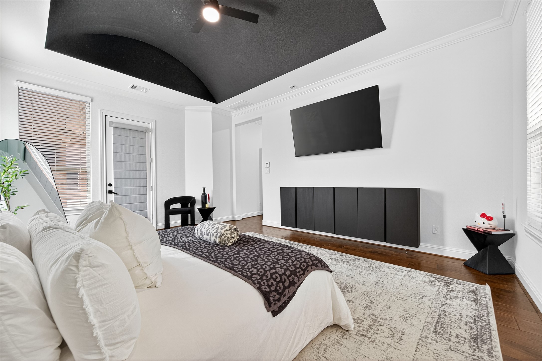 46 Sundown Ridge Place Tomball, TX 77375 - Photo 21 of 46 a bedroom with a bed and a flat screen tv