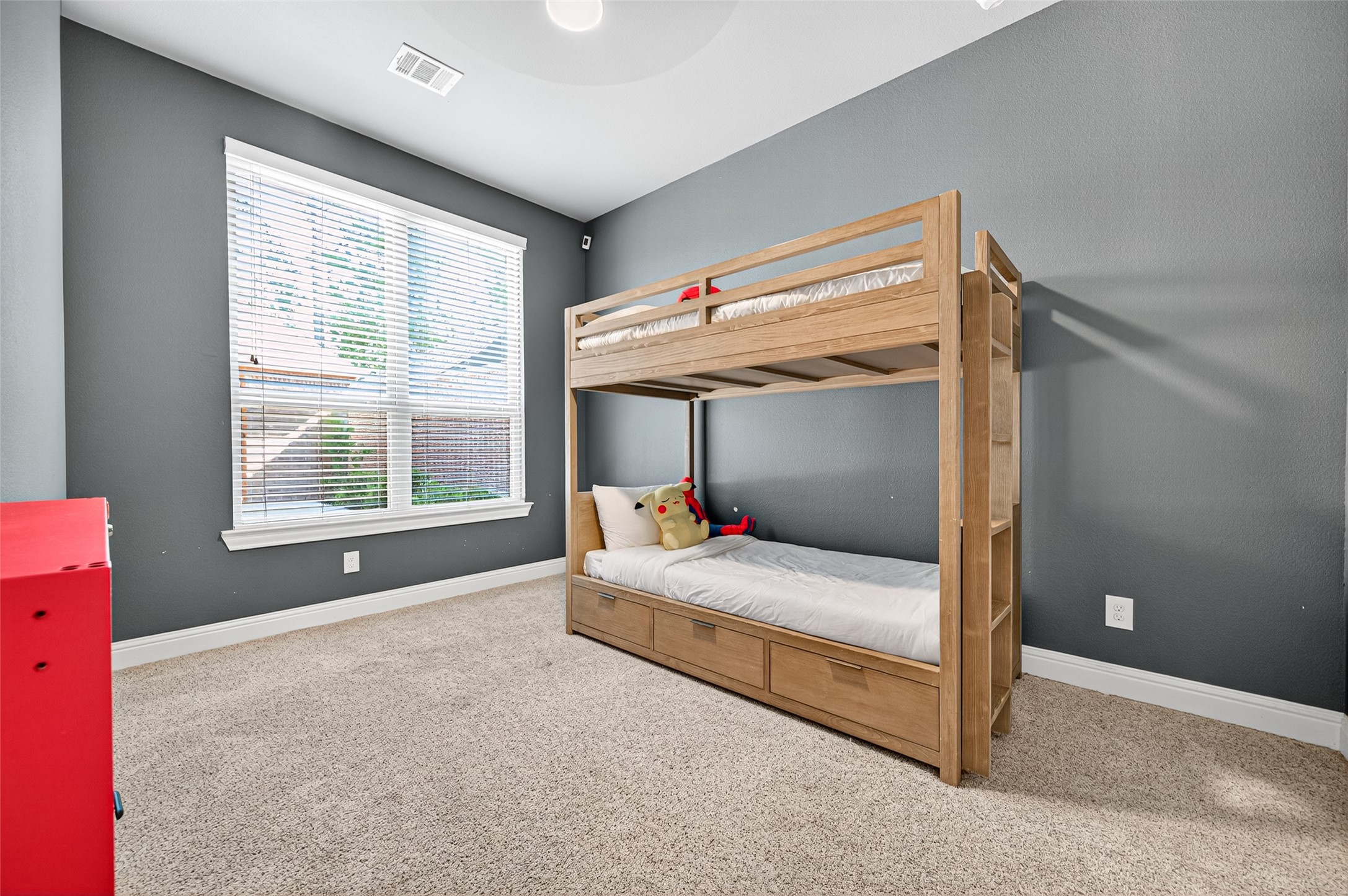 46 Sundown Ridge Place Tomball, TX 77375 - Photo 34 of 46 a bedroom with a bed and a window