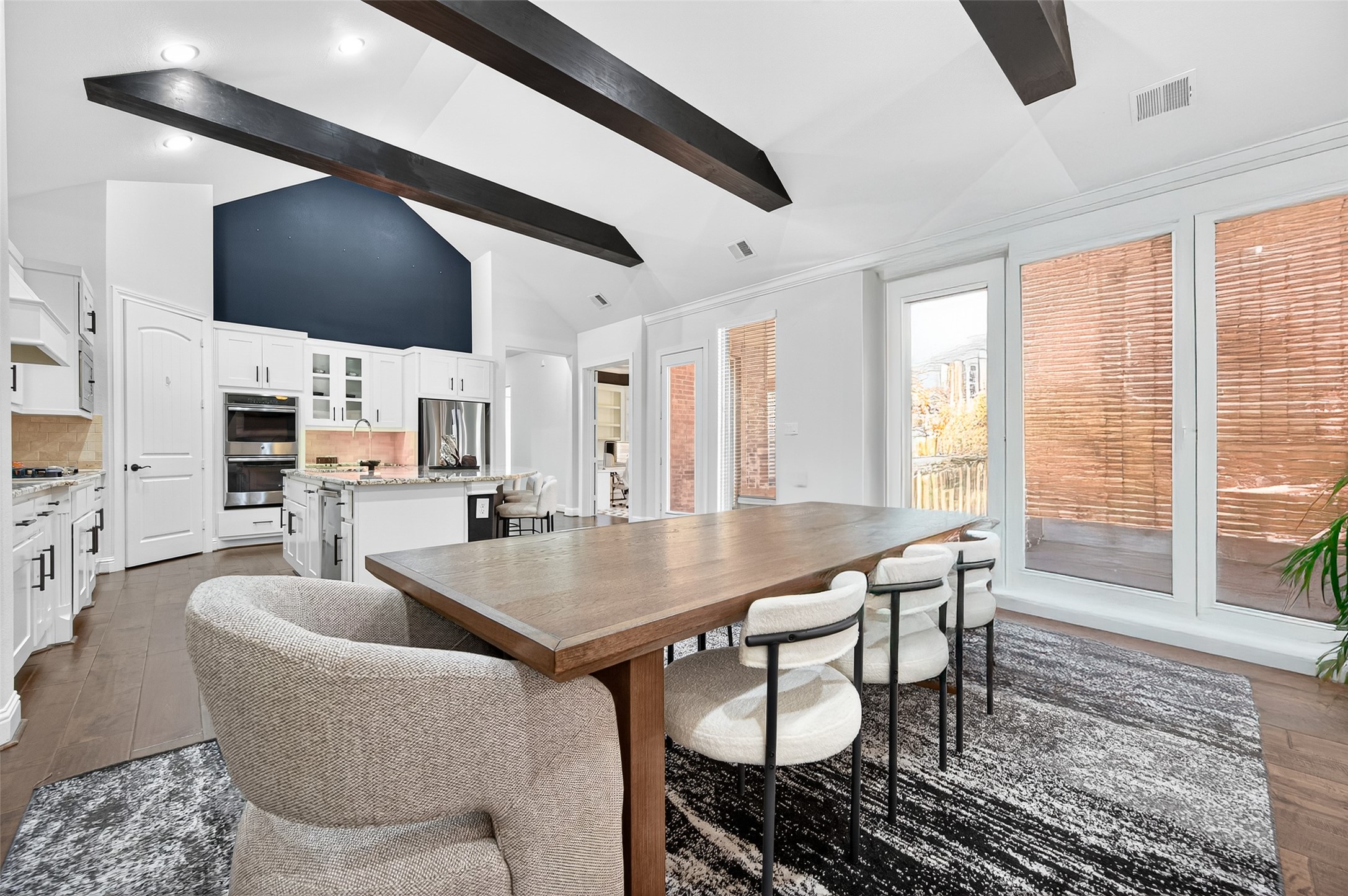 46 Sundown Ridge Place Tomball, TX 77375 - Photo 4 of 46 a dining room with furniture and wooden floor