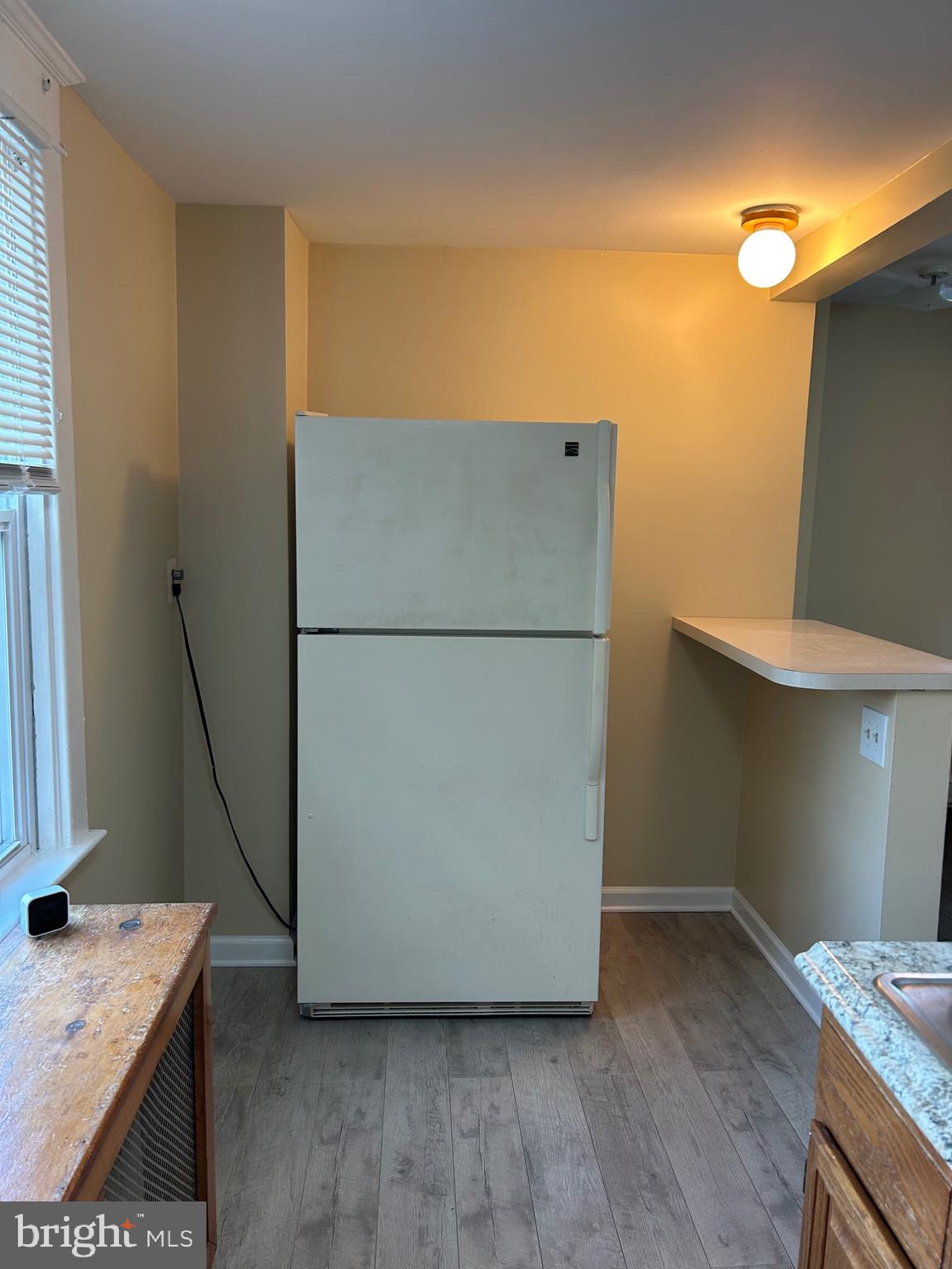 1005 Weller Avenue Havertown, PA 19083 - Photo 4 of 11 a kitchen with a refrigerator and a stove
