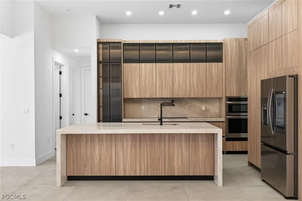 a white bath tub sitting in a bathroom