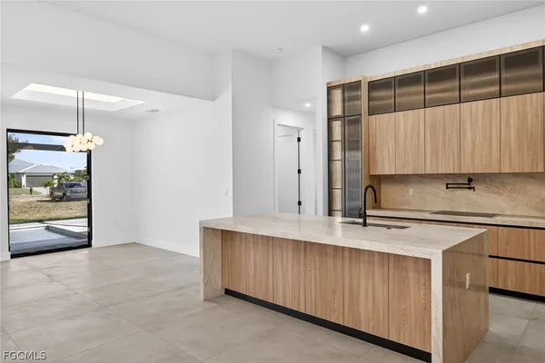 a bathroom with a bathtub and a sink