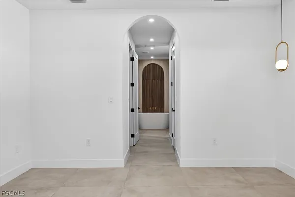 an aerial view of a house with a garden