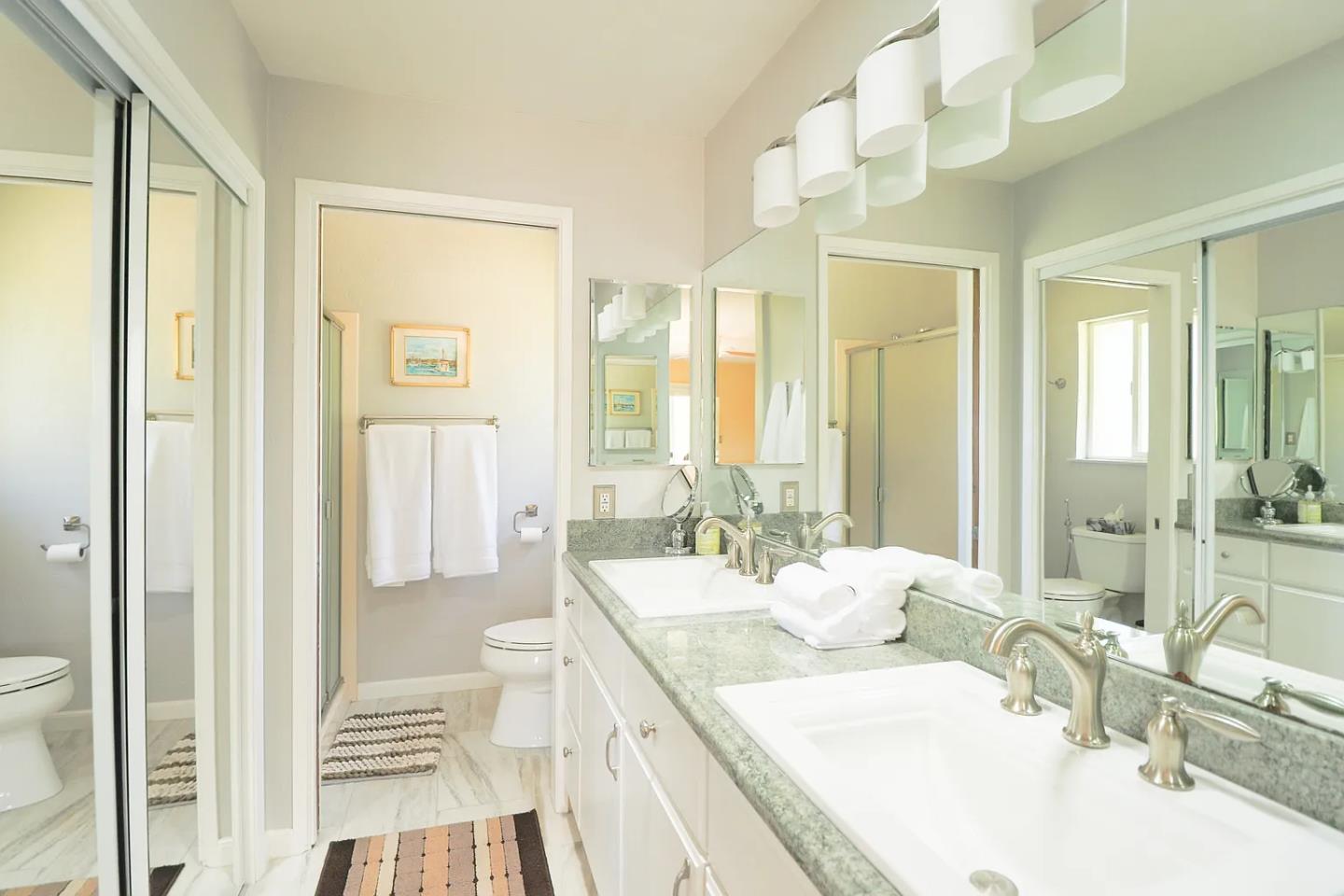 6600 Guerneville Road Sebastopol, CA 95472 - Photo 11 of 13 a large bedroom with a large bed and furniture