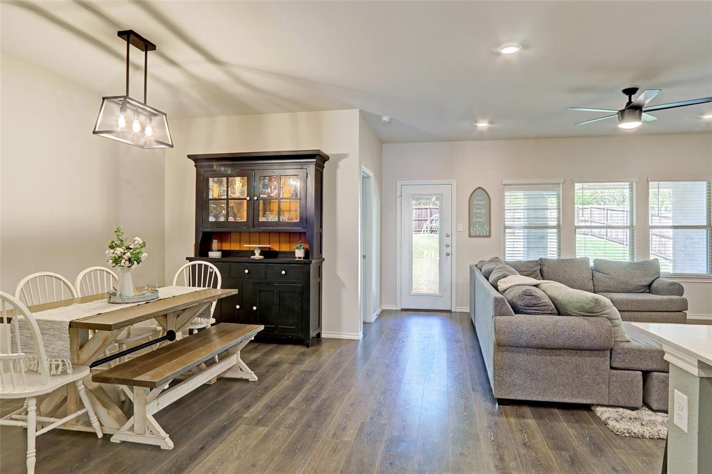 2213 Rosemary Way Anna, TX 75409 - Photo 11 of 27 a living room with furniture fireplace and wooden floor