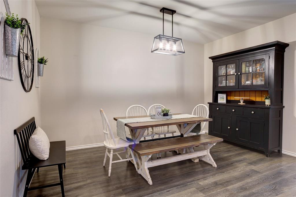 2213 Rosemary Way Anna, TX 75409 - Photo 12 of 27 a view of a room with furniture wooden floor and fan