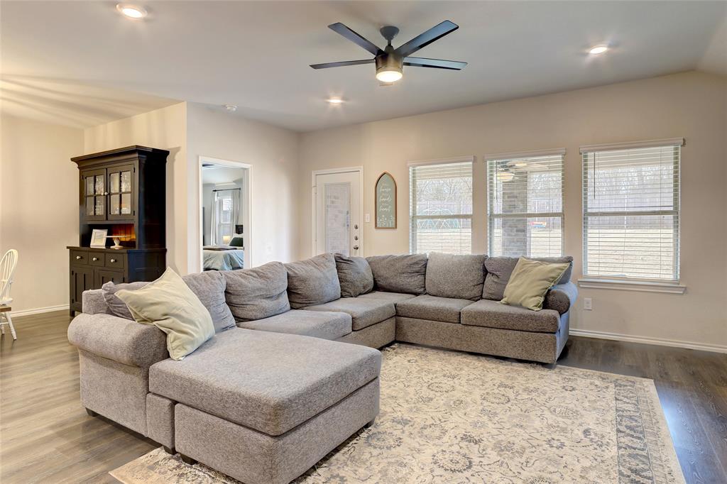 2213 Rosemary Way Anna, TX 75409 - Photo 15 of 27 a living room with furniture and a large window
