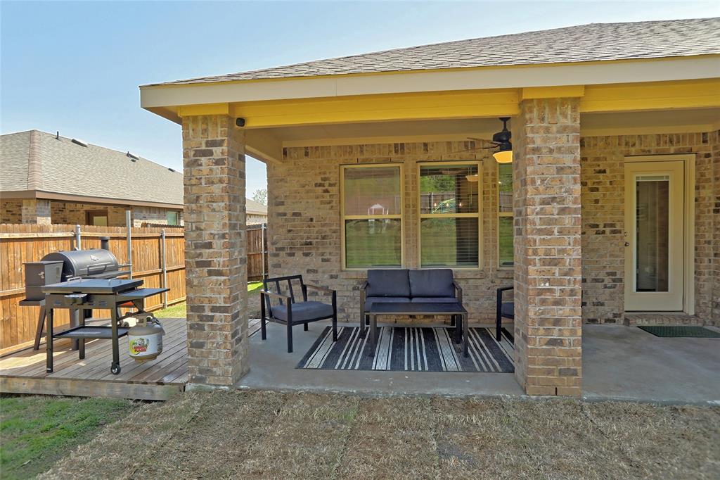 2213 Rosemary Way Anna, TX 75409 - Photo 23 of 27 a view of dining room filled with furniture and rug