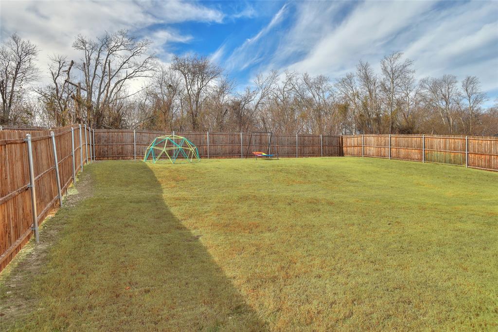 2213 Rosemary Way Anna, TX 75409 - Photo 26 of 27 a swimming pool with wooden fence