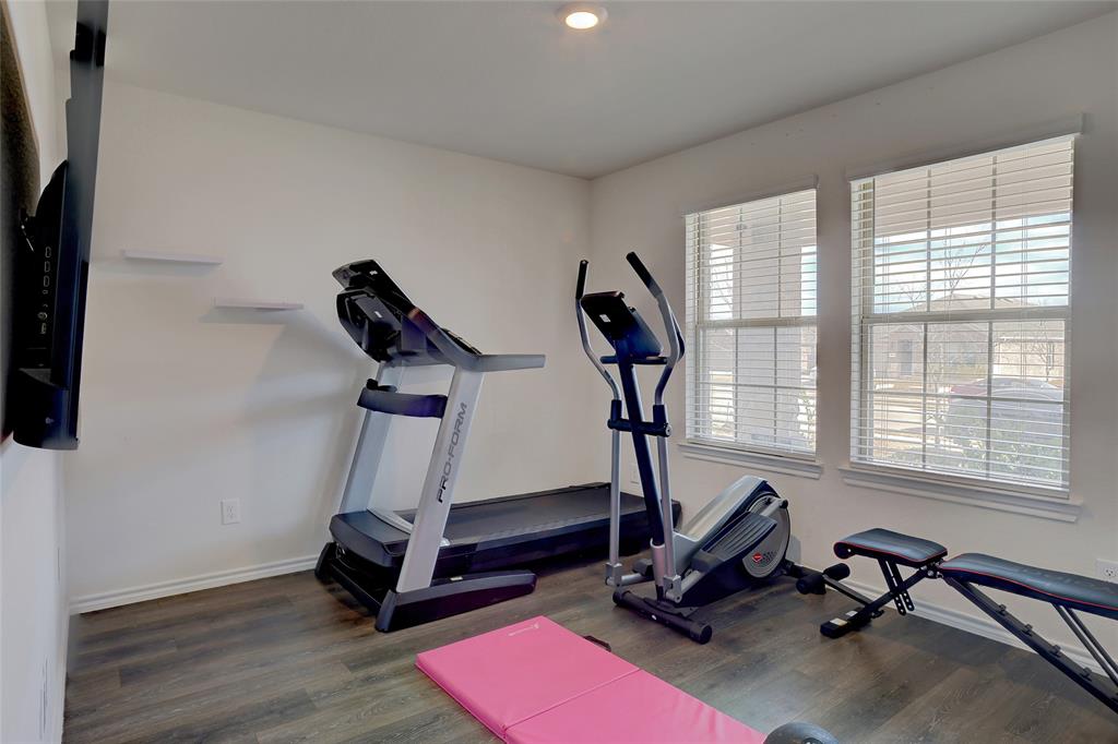 2213 Rosemary Way Anna, TX 75409 - Photo 4 of 27 a view of a room with gym equipment