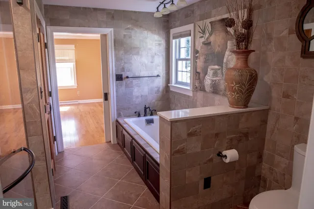 a view of livingroom with hardwood floor and window